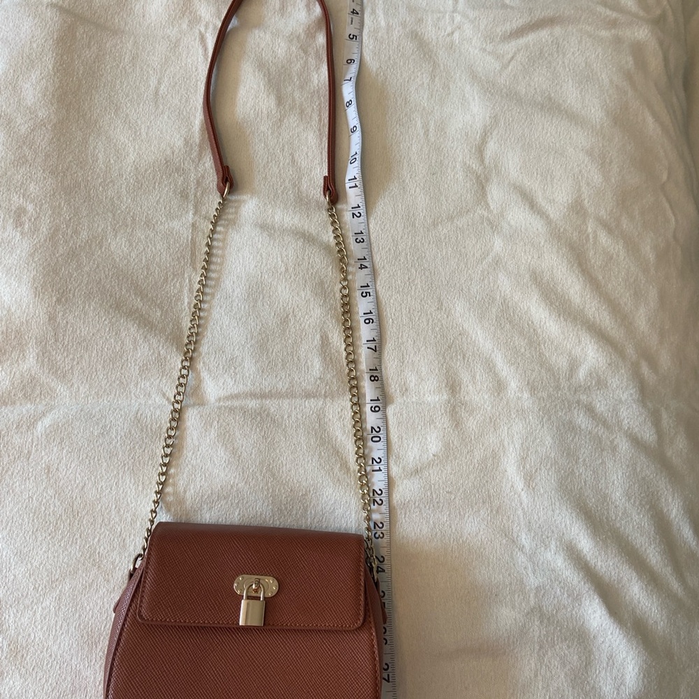 Brown Purse with strap stylish lock on the front 29X8
